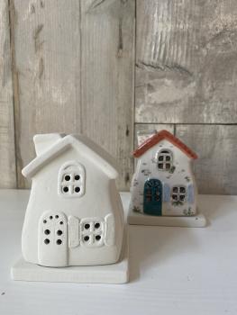 Lichthaus mit Untersetzer